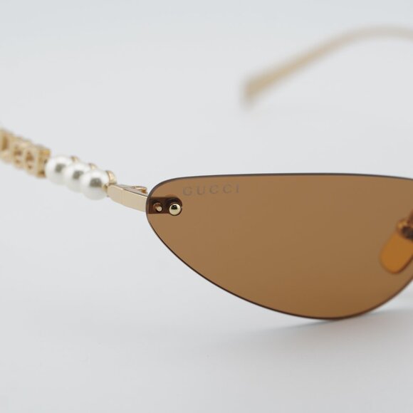 Gucci GG1920S 003 Sunglasses Shiny Endura Gold with Pearl Cat Eye Frame main image 4